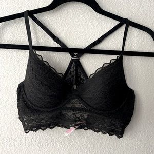 Victoria’s Secret pink black lace razorback bra. Sizes XS/TP.  Lightly patted.